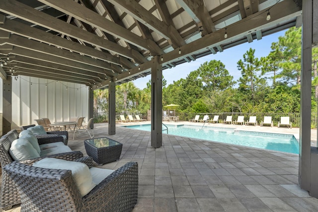 view of patio / terrace featuring a community pool