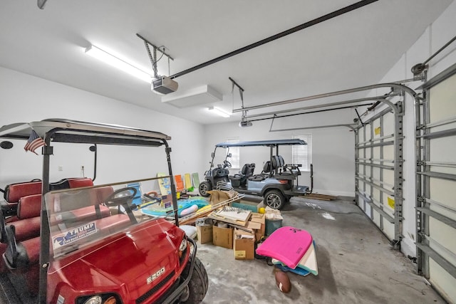 garage featuring a garage door opener