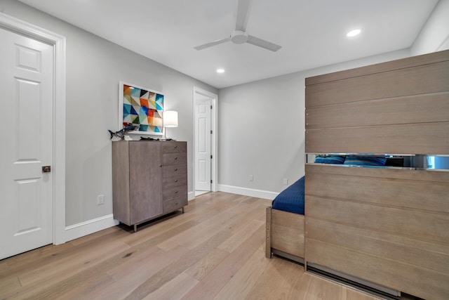 bedroom featuring ceiling fan and light wood-type flooring