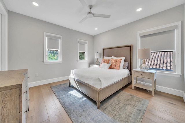 bedroom featuring ceiling fan and light wood-type flooring