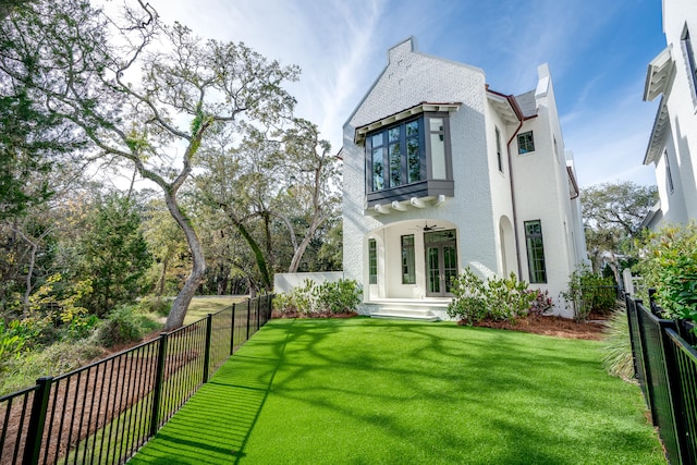 exterior space with a front yard