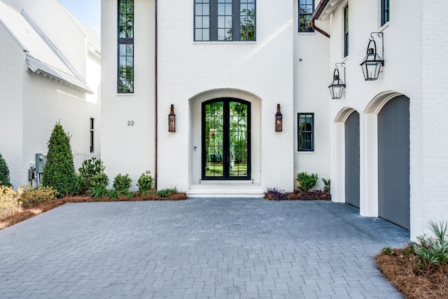 entrance to property featuring french doors