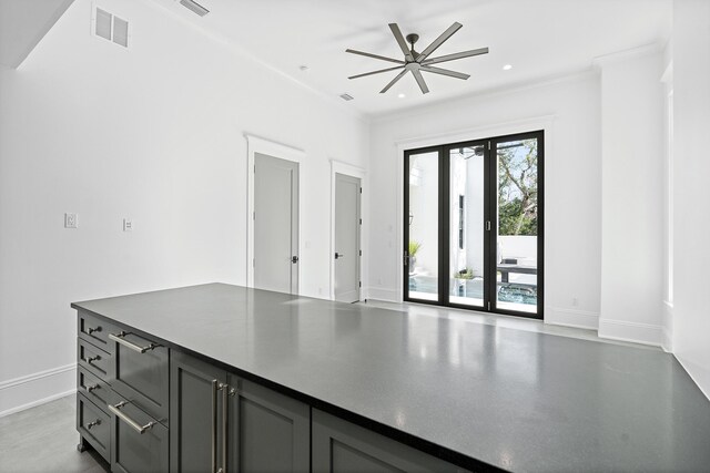 interior space with ceiling fan and french doors