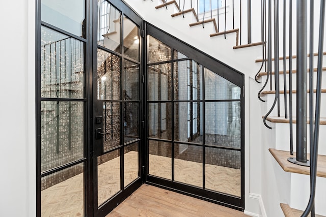 entryway with light wood-type flooring