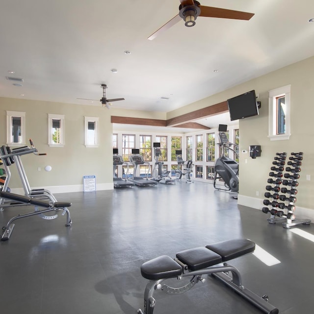 workout area featuring ceiling fan and french doors