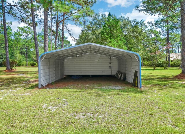 exterior space with a yard and a carport