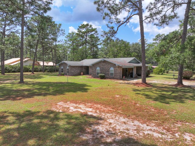 view of front of property with a front yard