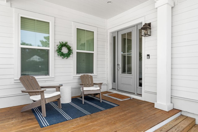 wooden terrace featuring a porch