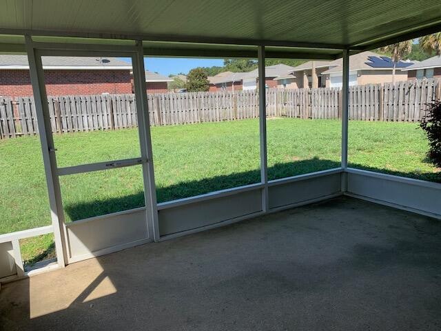 view of unfurnished sunroom