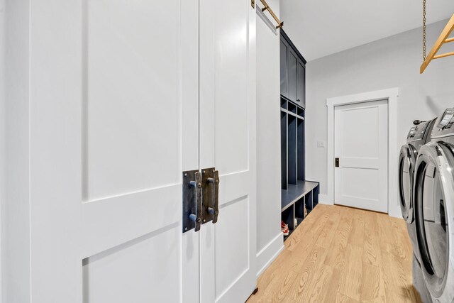 interior space featuring light hardwood / wood-style floors and washing machine and dryer