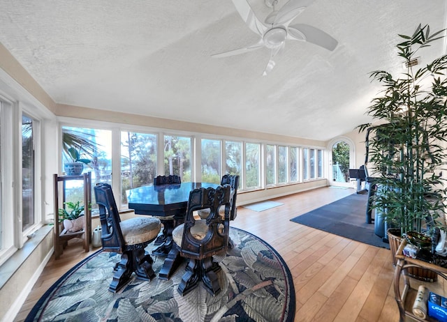 sunroom / solarium with ceiling fan