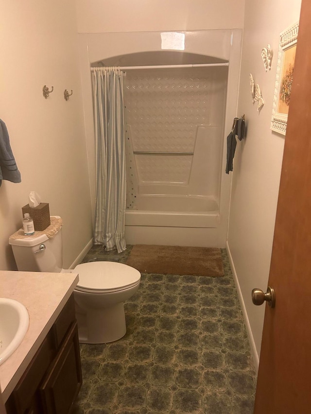 full bathroom featuring tile flooring, vanity, shower / bath combo, and toilet