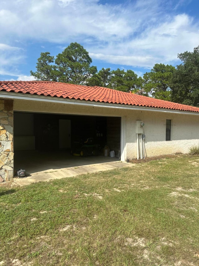 rear view of house with a yard