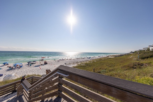 property view of water featuring a beach view