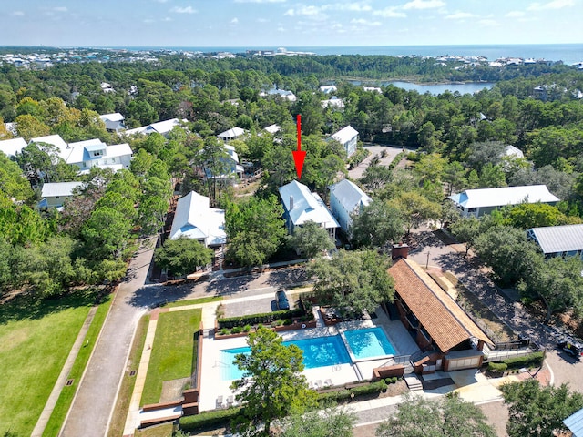 birds eye view of property with a water view