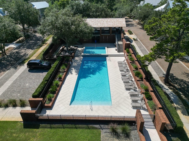 view of swimming pool featuring a patio