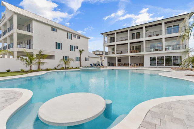 view of pool featuring a patio area