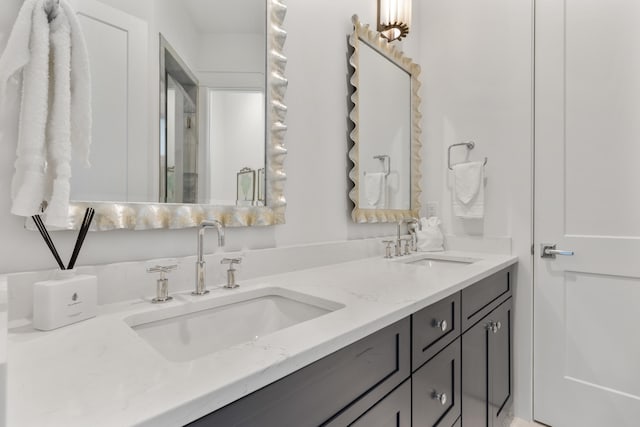 bathroom with dual bowl vanity