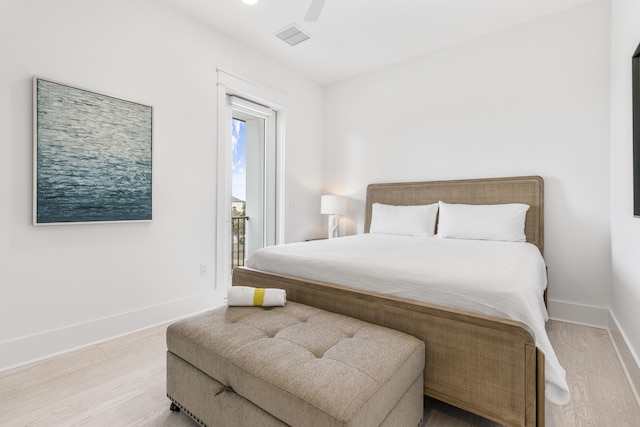 bedroom featuring ceiling fan and light wood-type flooring