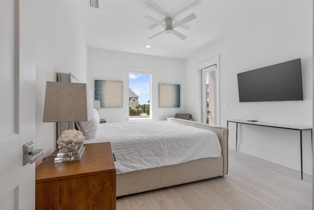 bedroom featuring ceiling fan and light hardwood / wood-style floors