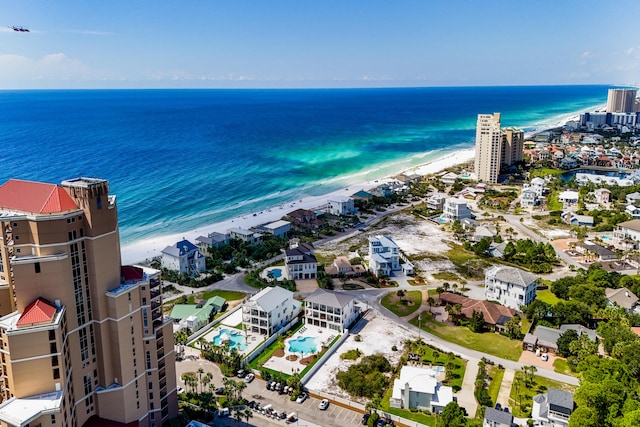 aerial view featuring a water view and a beach view