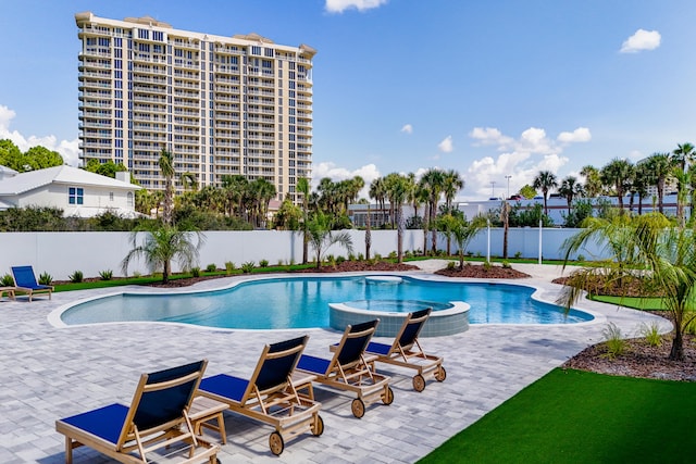 view of pool featuring a patio area