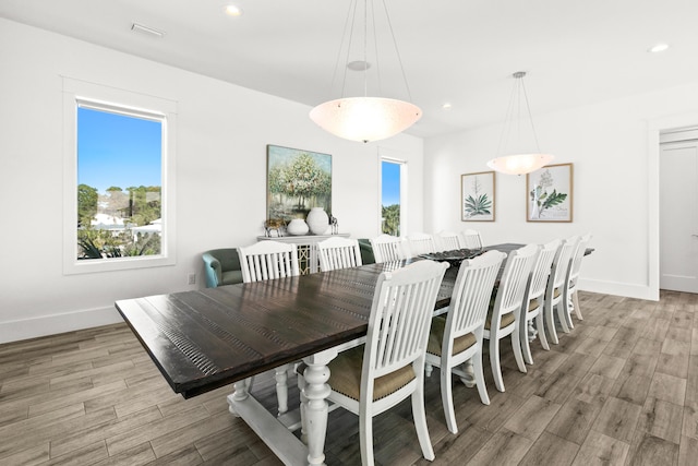 dining room with light hardwood / wood-style flooring