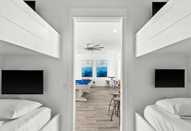 bedroom featuring light hardwood / wood-style floors and pool table