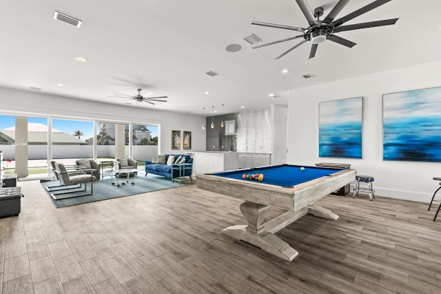 playroom with ceiling fan, pool table, and light hardwood / wood-style floors