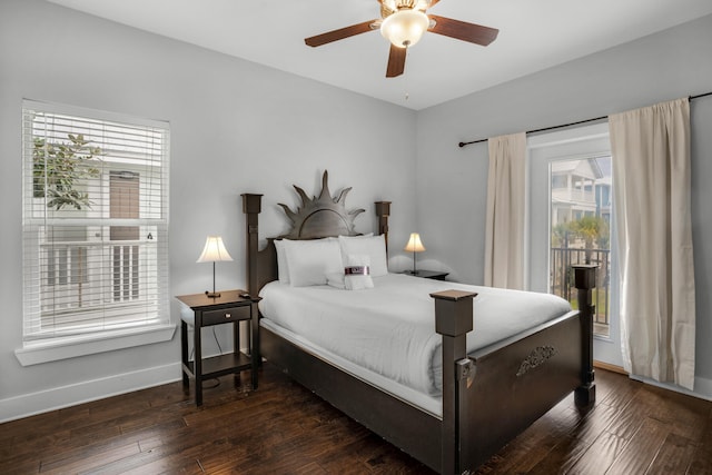 bedroom with dark hardwood / wood-style flooring and ceiling fan