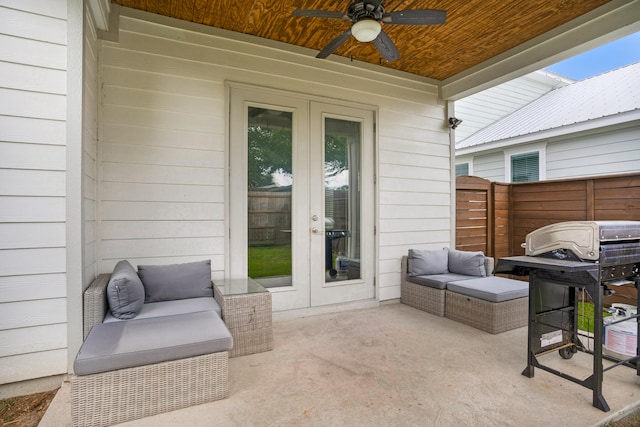 view of terrace featuring french doors, ceiling fan, and an outdoor living space