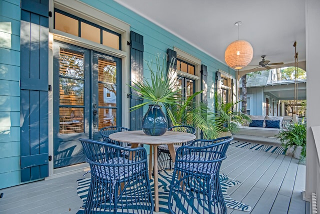 wooden terrace with ceiling fan