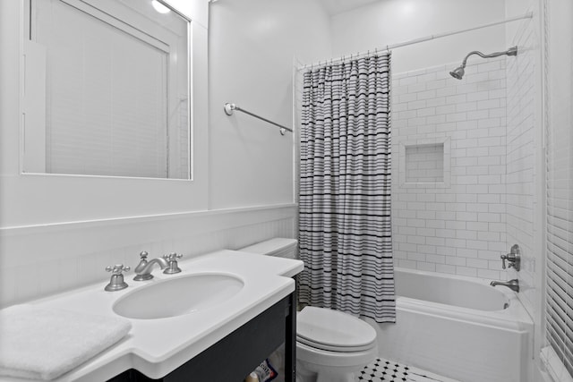 full bathroom featuring tile flooring, vanity, toilet, and shower / bathtub combination with curtain