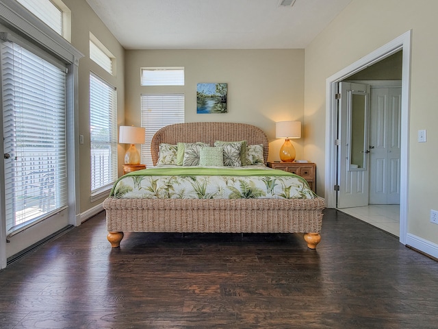 bedroom featuring dark hardwood / wood-style floors