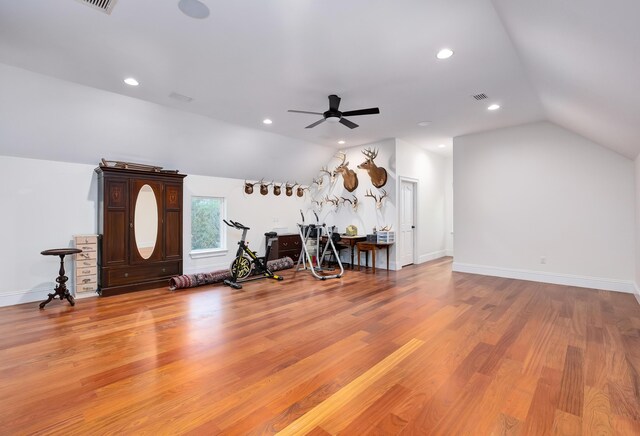 bonus room with ceiling fan, light hardwood / wood-style floors, and vaulted ceiling