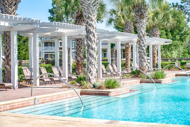 view of pool featuring a pergola and a patio area