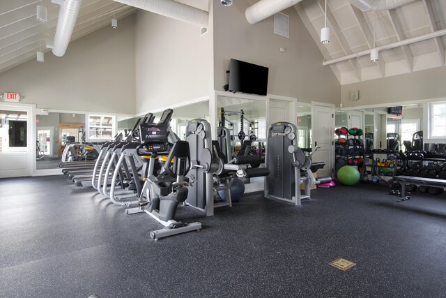 gym with high vaulted ceiling