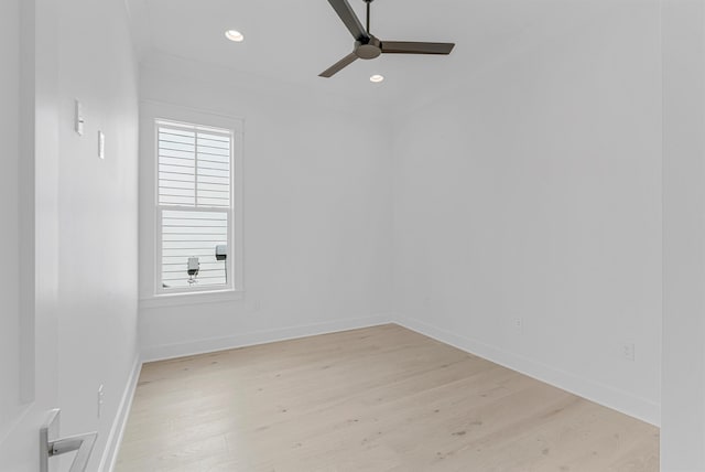 empty room with a ceiling fan, recessed lighting, baseboards, and light wood finished floors