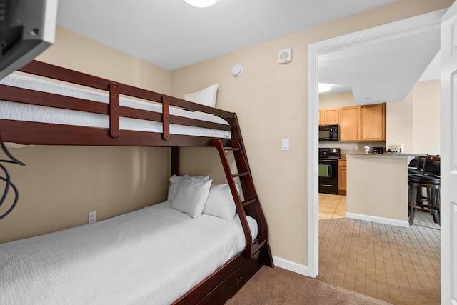 bedroom featuring light tile flooring