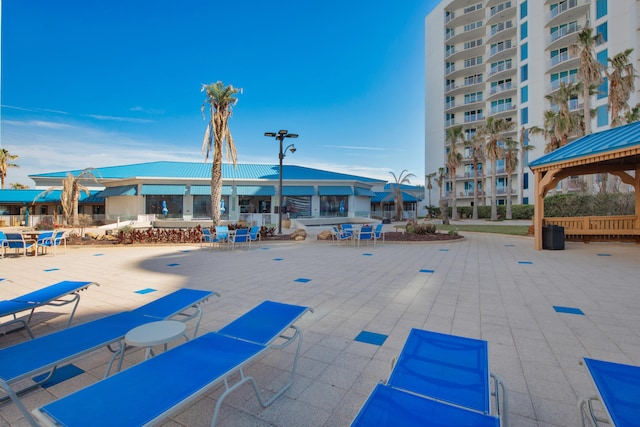 view of home's community featuring a patio