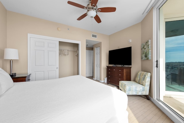 bedroom with a closet and ceiling fan