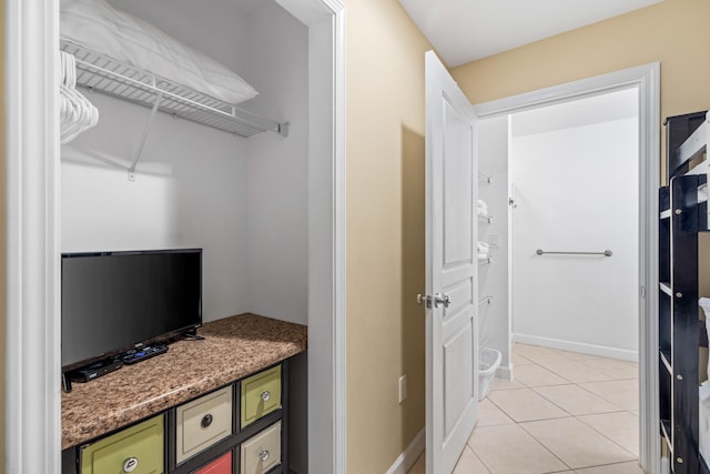 interior space featuring light tile patterned floors