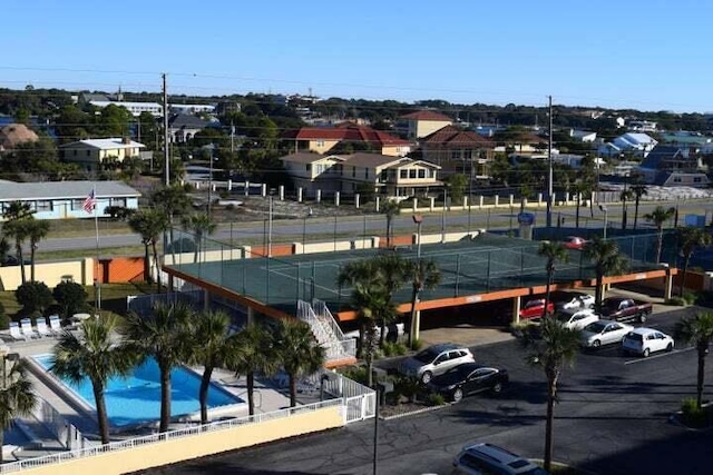 exterior space featuring a fenced in pool