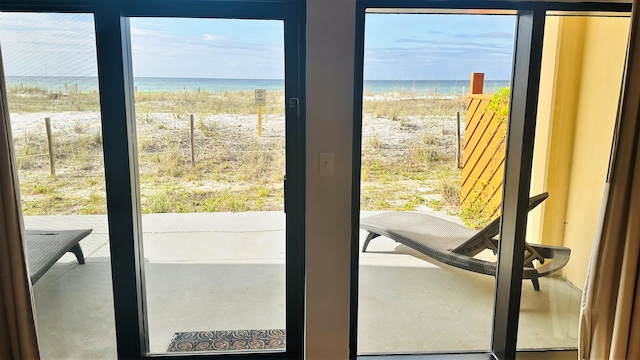 entryway with a water view