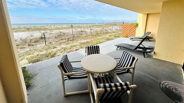 view of patio / terrace with a water view