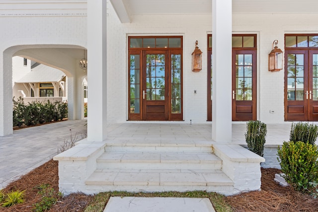 entrance to property featuring french doors