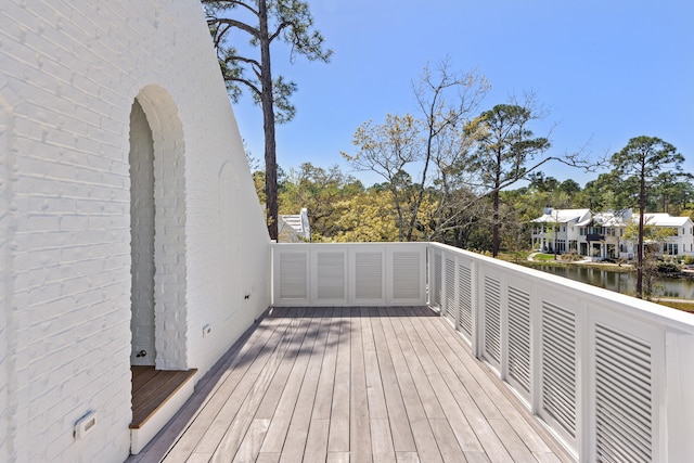 deck featuring a water view