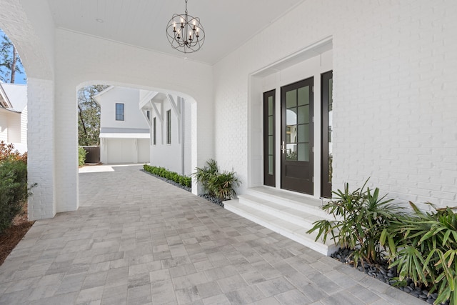 entrance to property featuring a porch