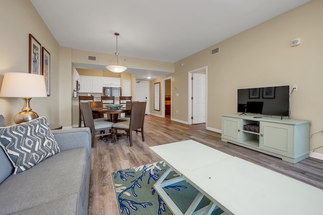 living room with light wood-type flooring