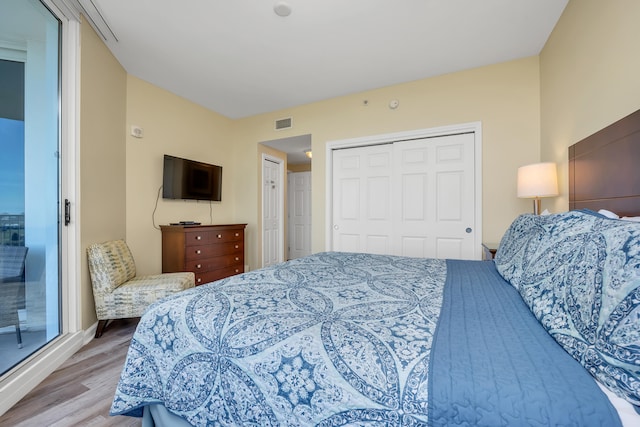 bedroom with light wood-type flooring